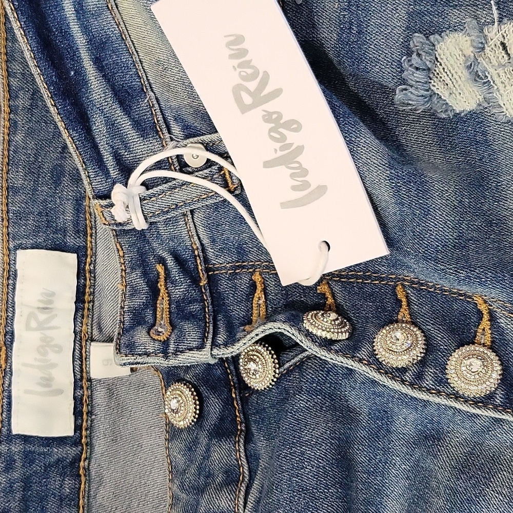 Jeans they are so adorable. Would look cute with any blouse.